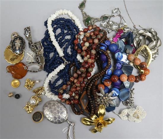 A quantity of silver and costume jewellery, including an enclosed locket and an Art Nouveau style pendant